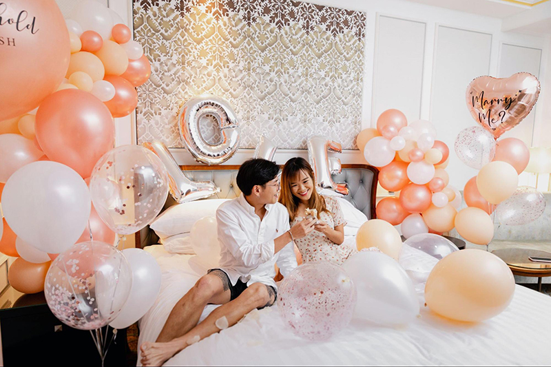 A couple enjoying Proposal Setup Decoration